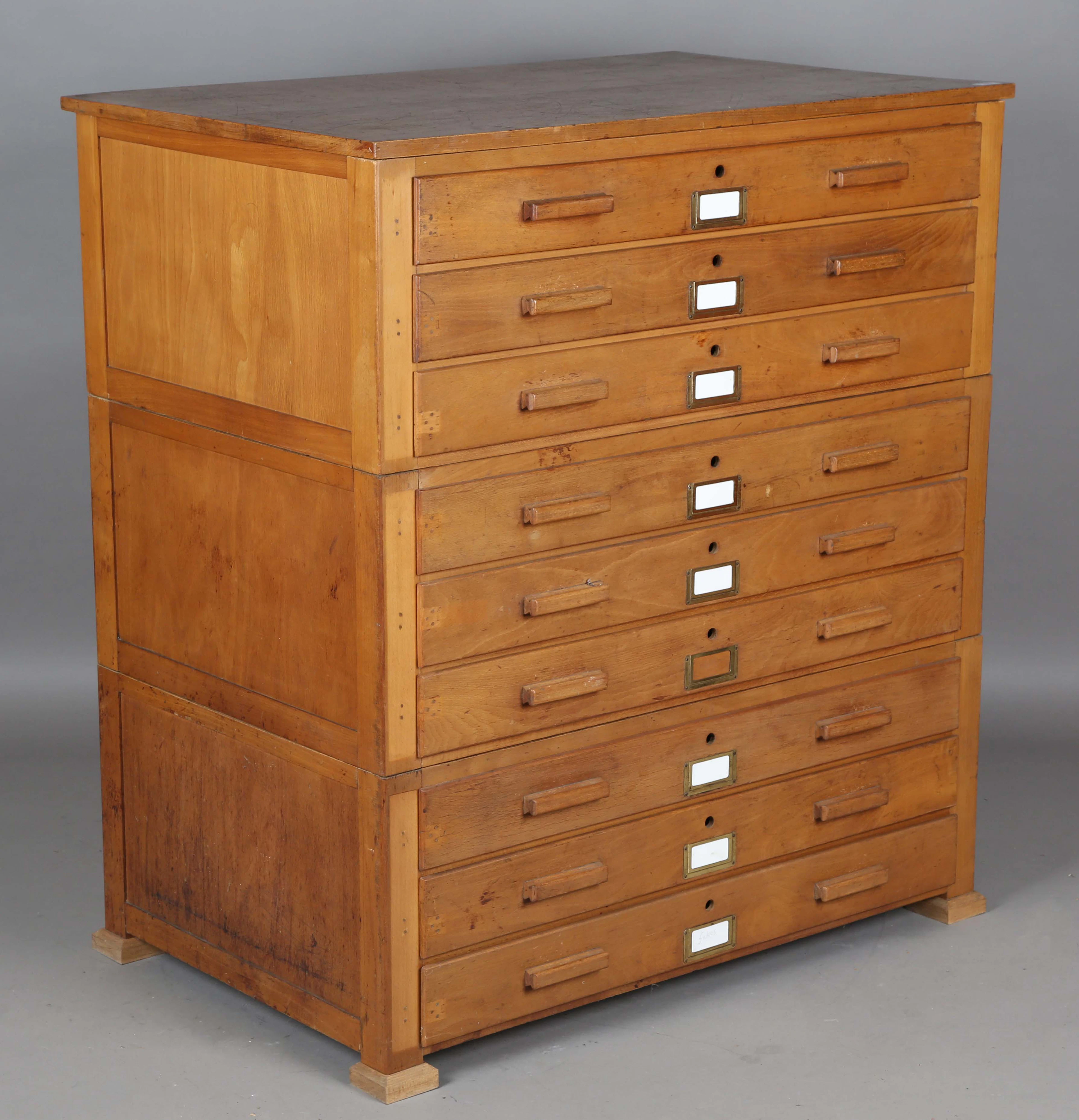 A mid-20th century ash planner's or folio chest of nine drawers, height