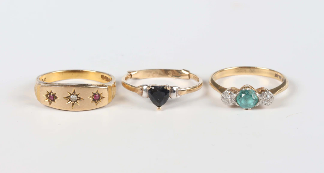 A gold, platinum, blue zircon and diamond ring, mounted with the circular