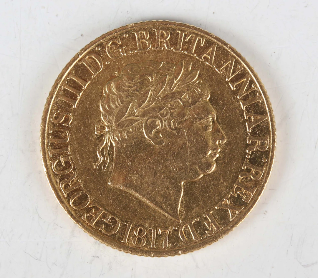 A George III sovereign 1817, Sp 3785 (good/very fine). Note: this