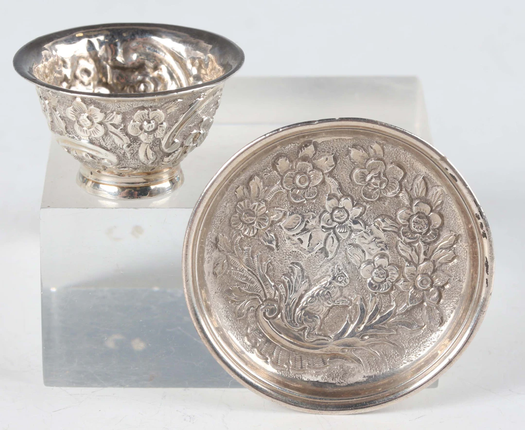 A rare Queen Anne miniature toy silver teabowl and saucer, each piece