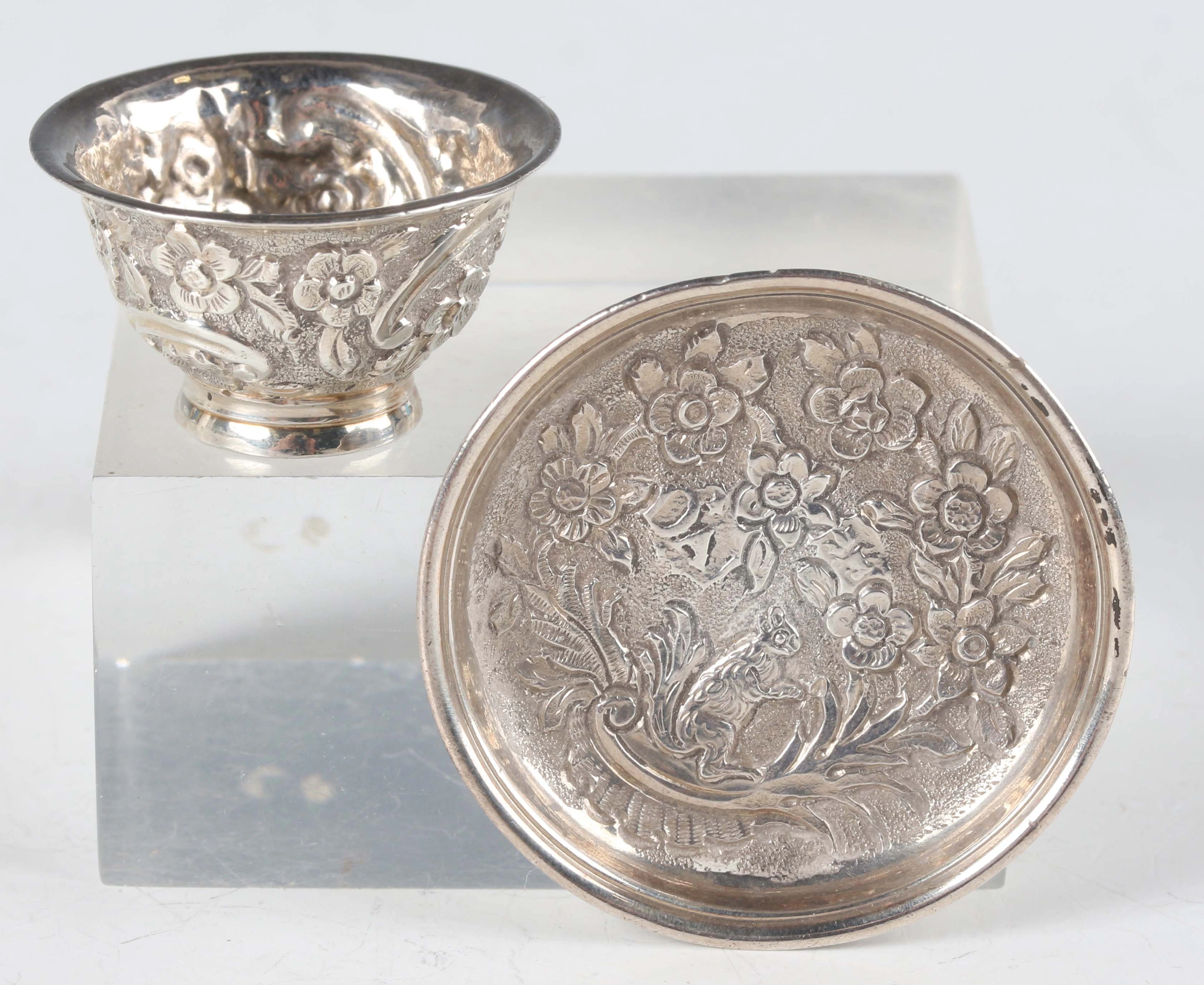 A rare Queen Anne miniature toy silver teabowl and saucer, each piece