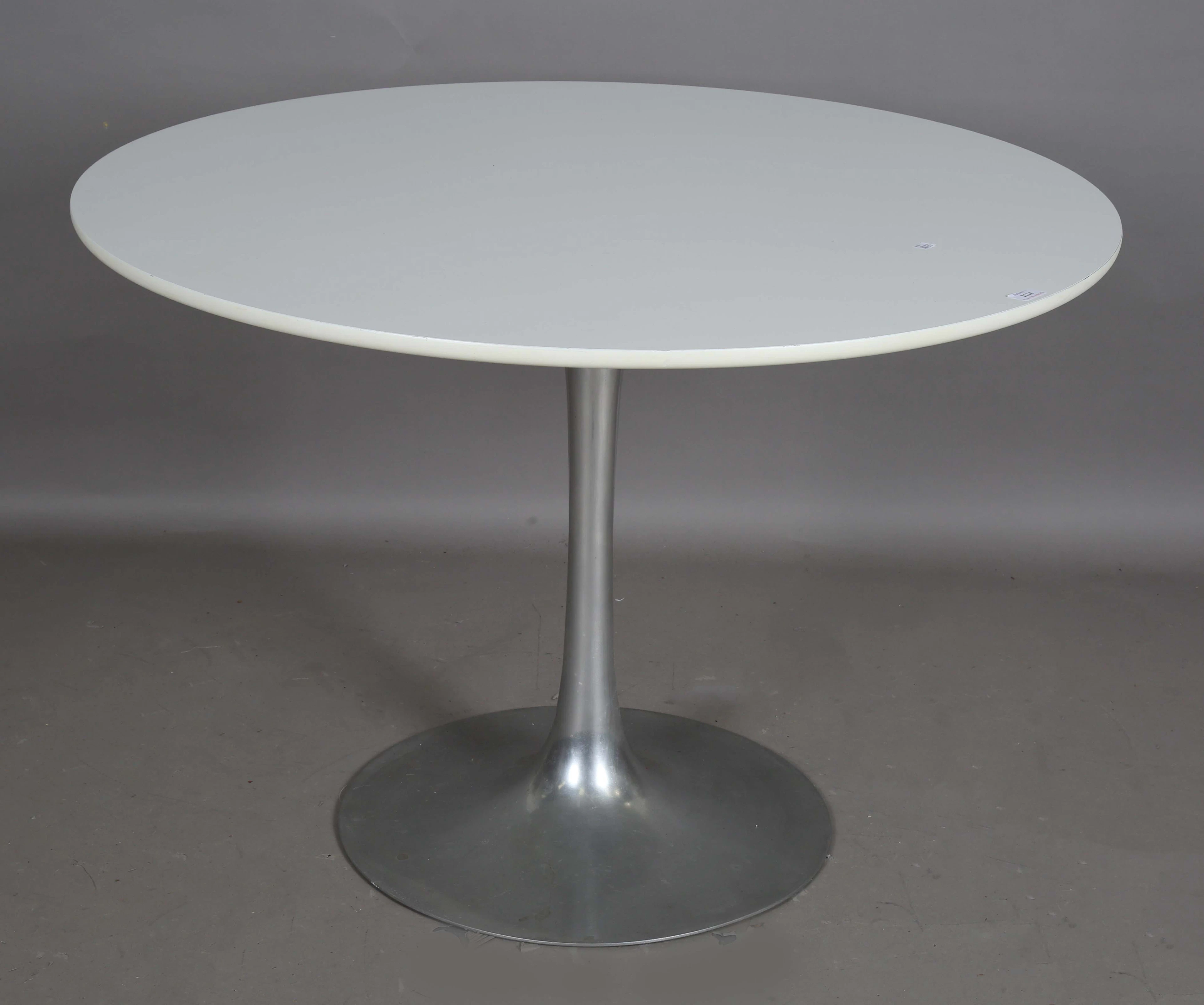 A mid-20th century white laminate and aluminium 'tulip' dining table