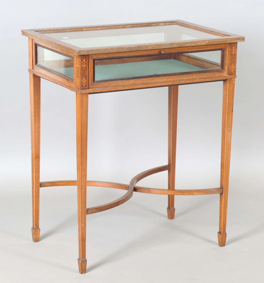 An Edwardian mahogany and foliate inlaid bijouterie table, on square