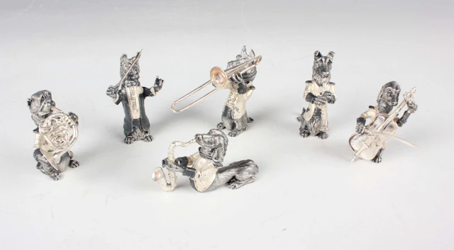 A set of six Spanish silver J.M. Calero style models of dogs playing