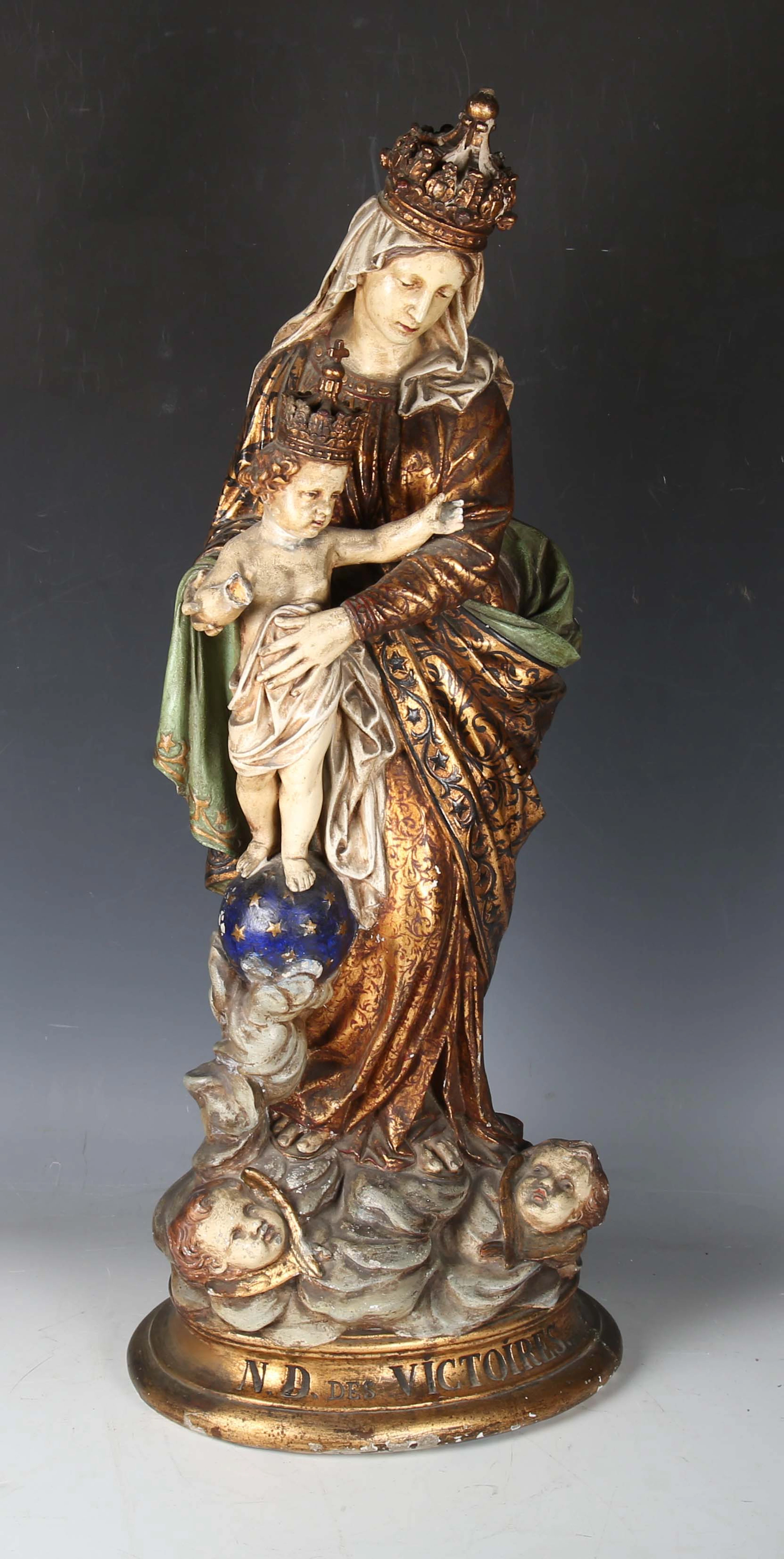A large early 20th century French gilded and painted plaster figure