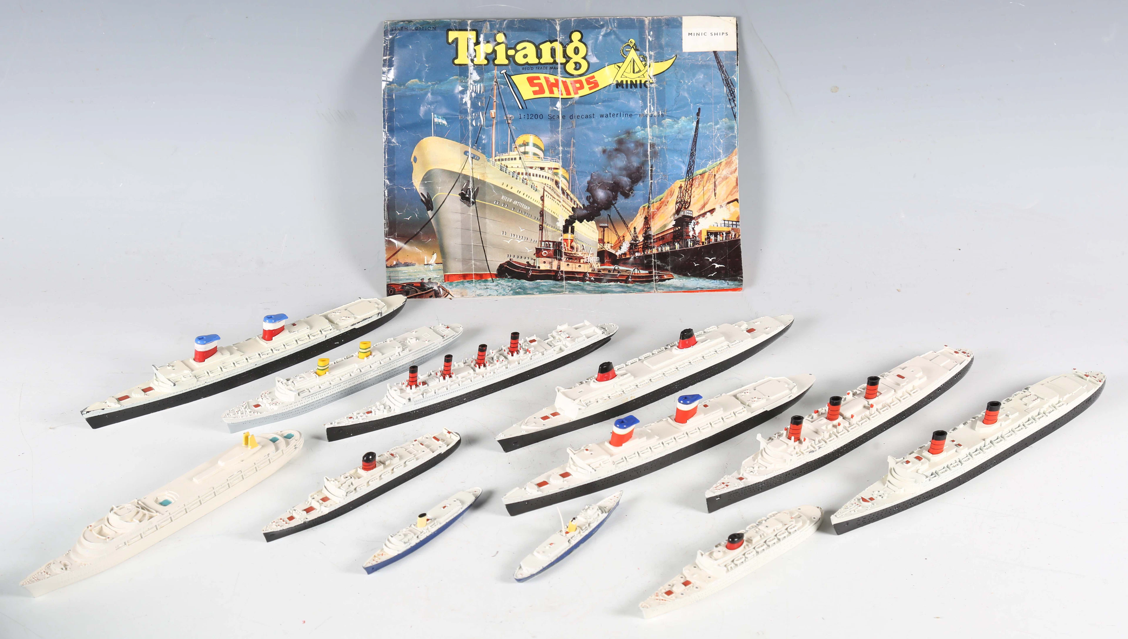 A collection of Tri-ang ships and accessories, including three M702s