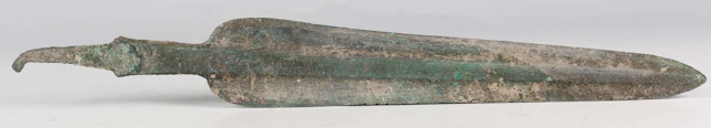 A Luristan bronze spearhead, circa 1200-600 BC, the double-edged blade