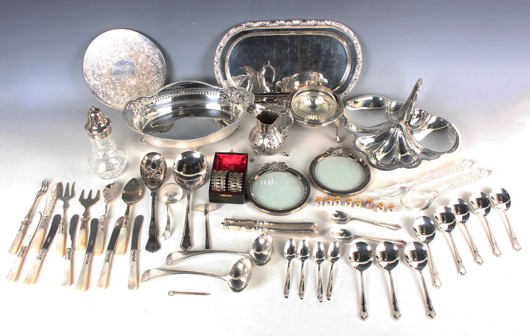 A collection of assorted plated items, including a shaped oval basket