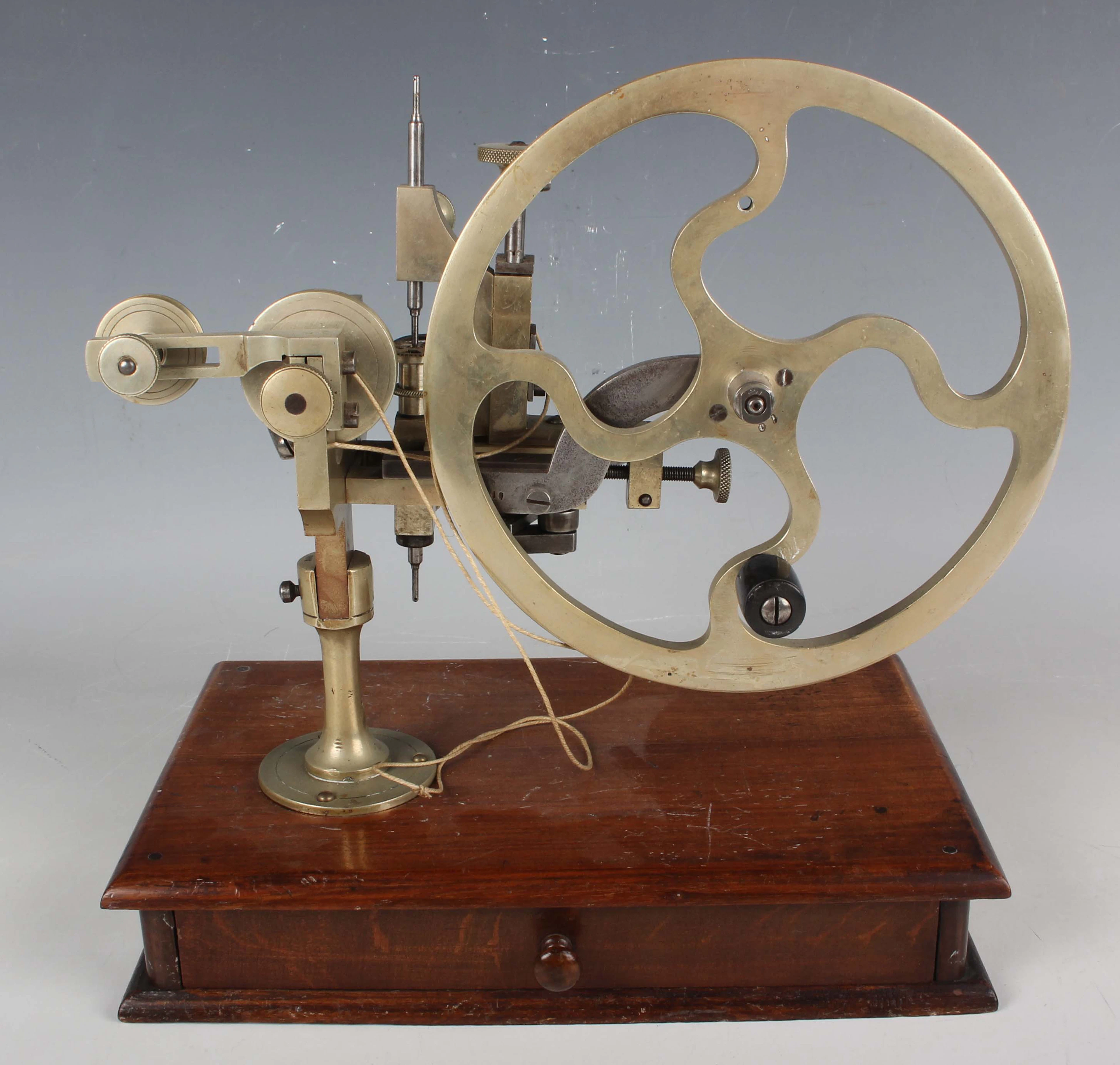 A late 19th century nickel and steel watchmaker's topping tool, variously