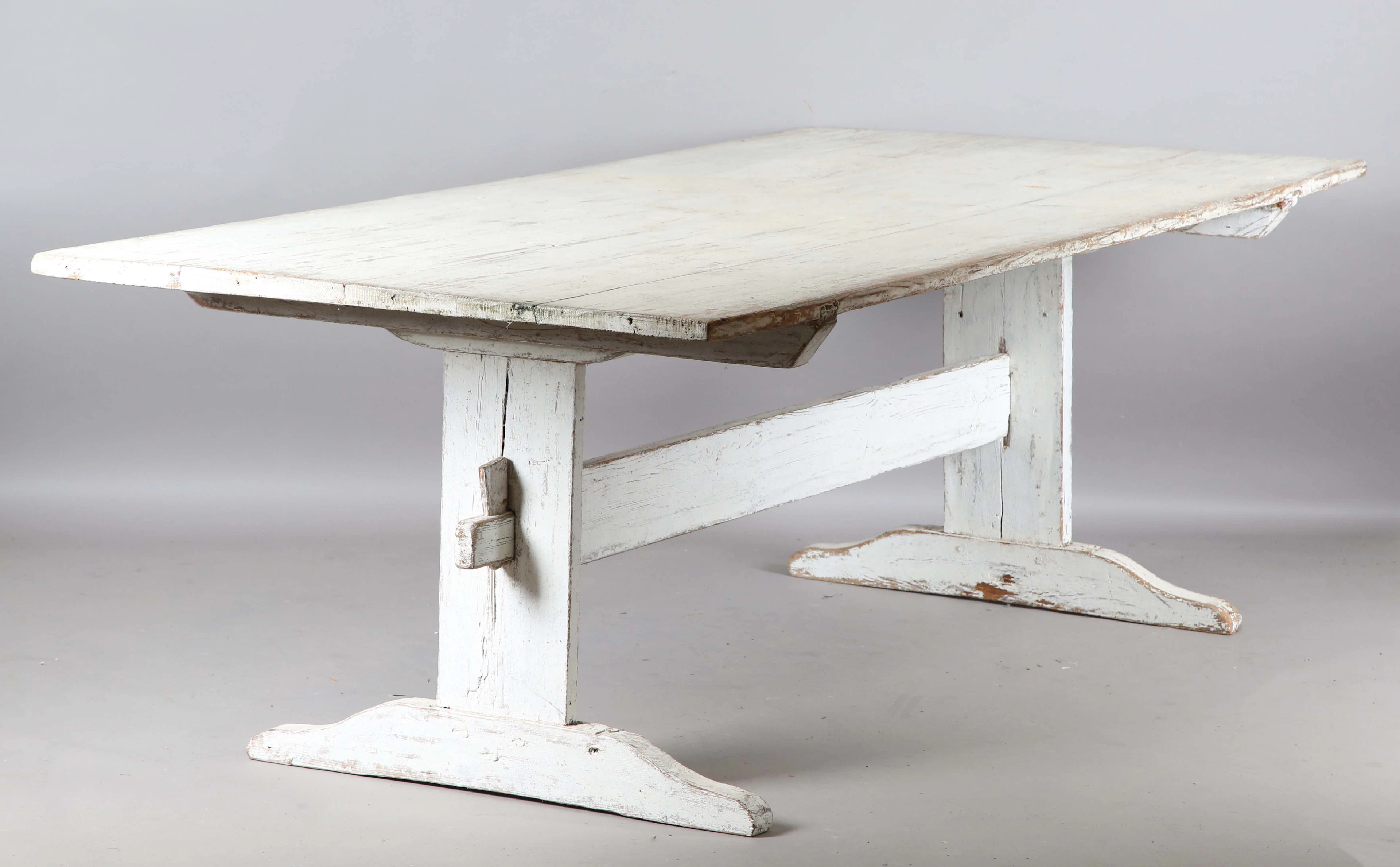 A large 19th century Swedish white dragged pine farmhouse table, the