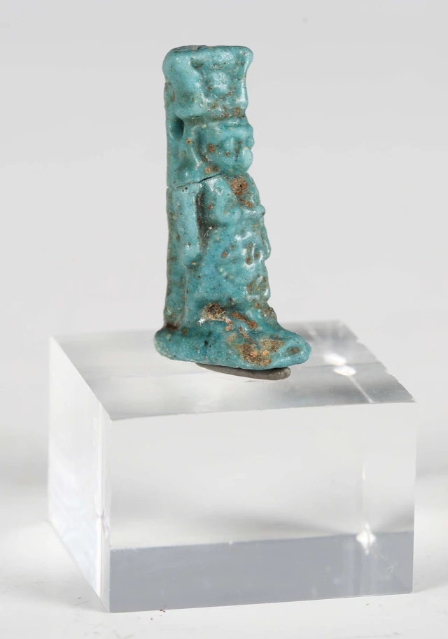 An ancient Egyptian turquoise glazed faience amulet, representing