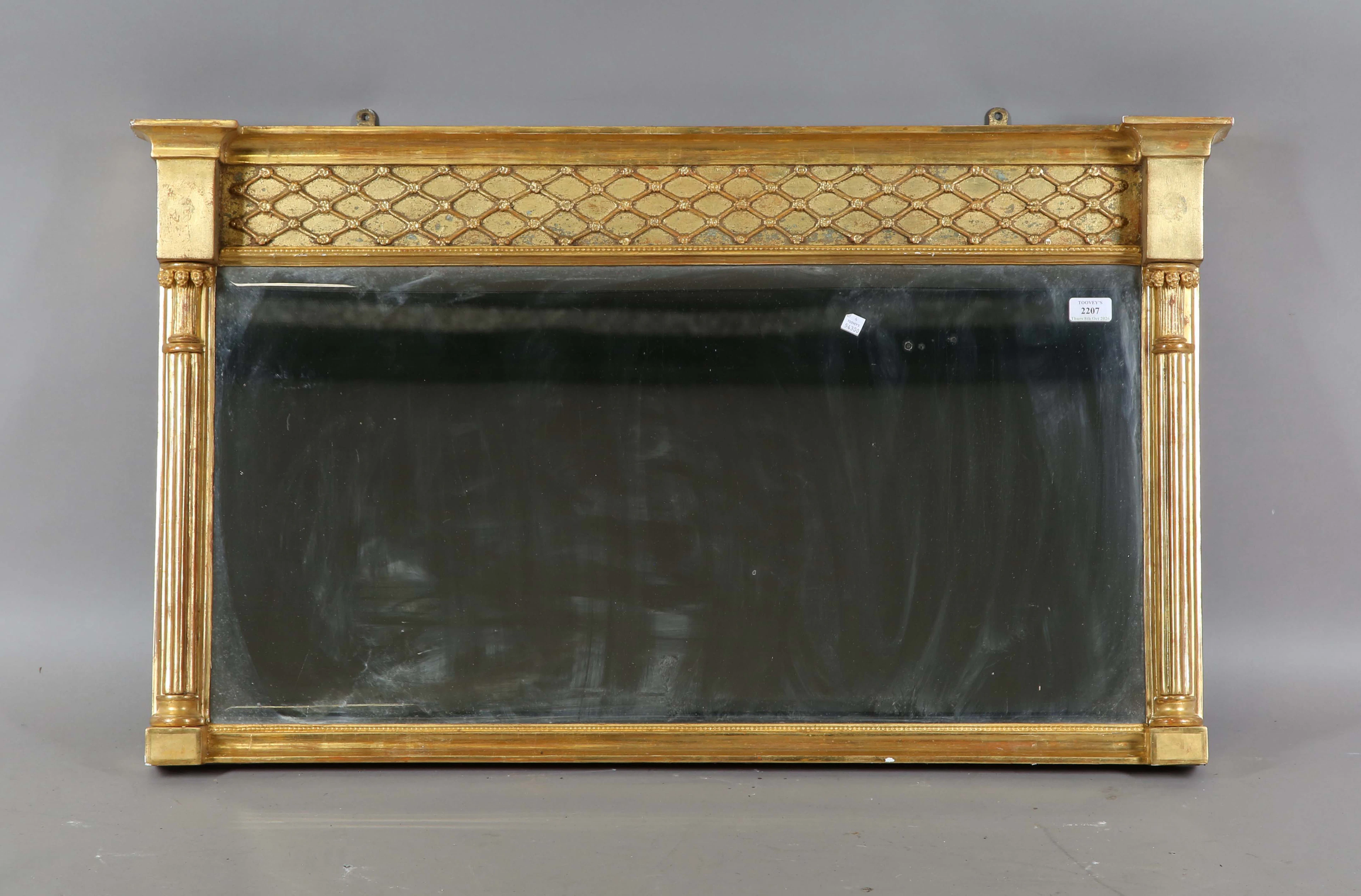 A 19th century giltwood and gesso overmantel mirror, the lattice moulded