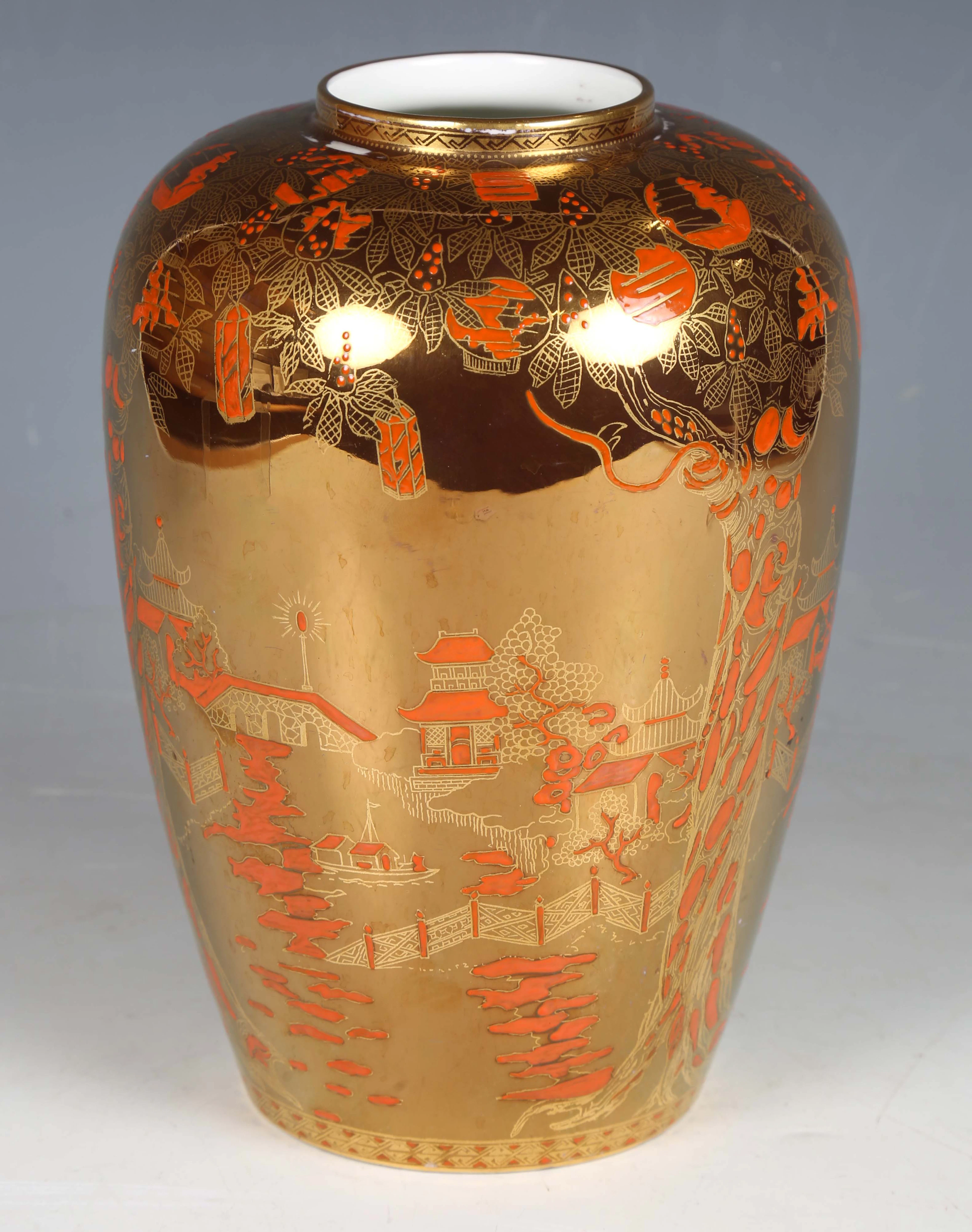 A Wedgwood Coral and Bronze Fairyland lustre vase, circa 1925, designed