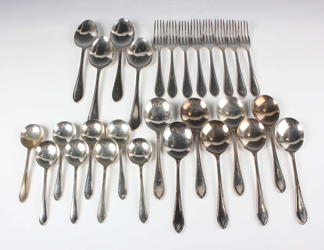 An Elizabeth II part canteen of silver Sandringham pattern cutlery