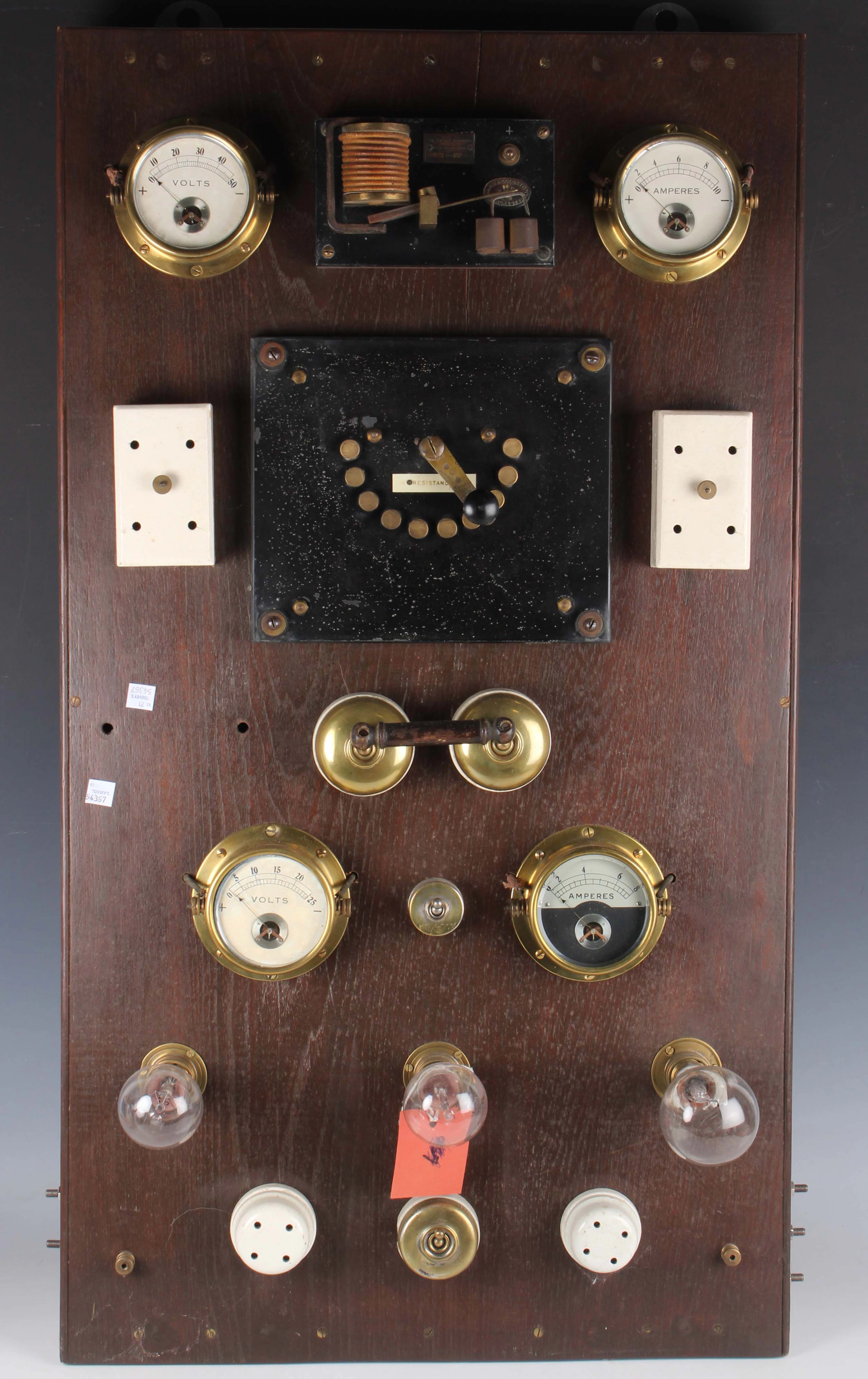 A mid-20th century electrical control or switchboard panel, mounted