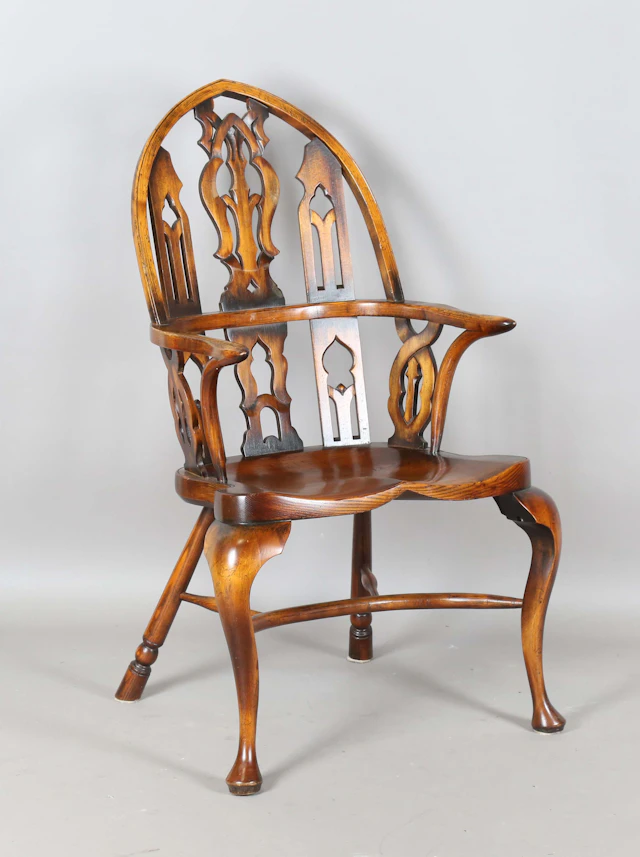 A late 20th century ash and elm Thames Valley style Windsor armchair
