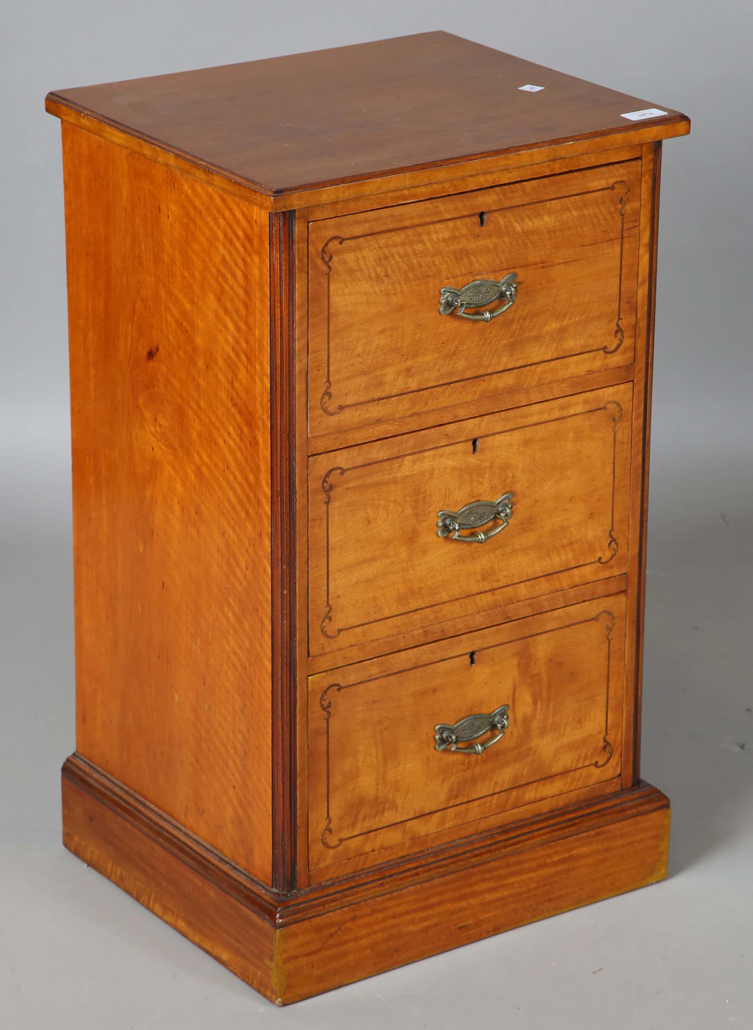 An early 20th century satin birch chest of three drawers, height 74cm