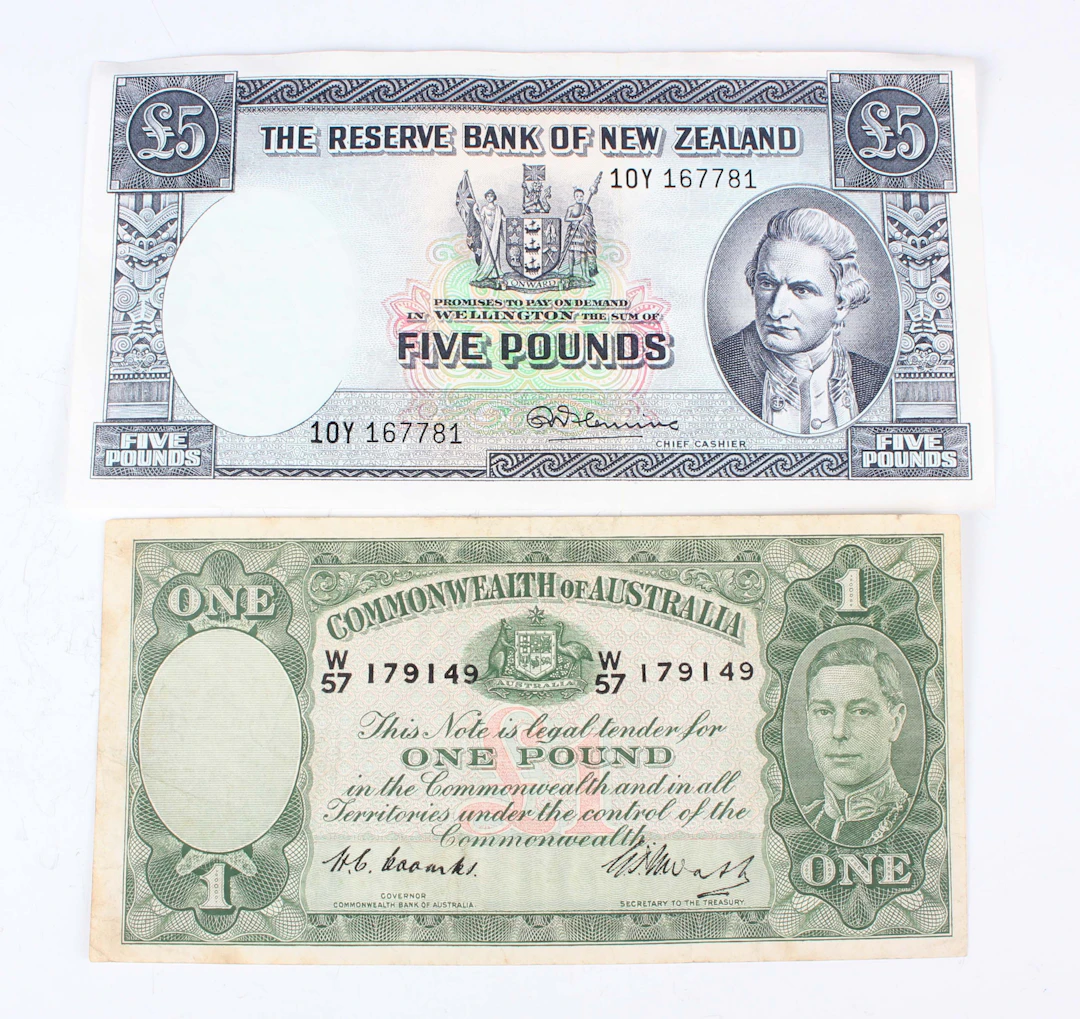 A small collection of Australian and New Zealand banknotes, including