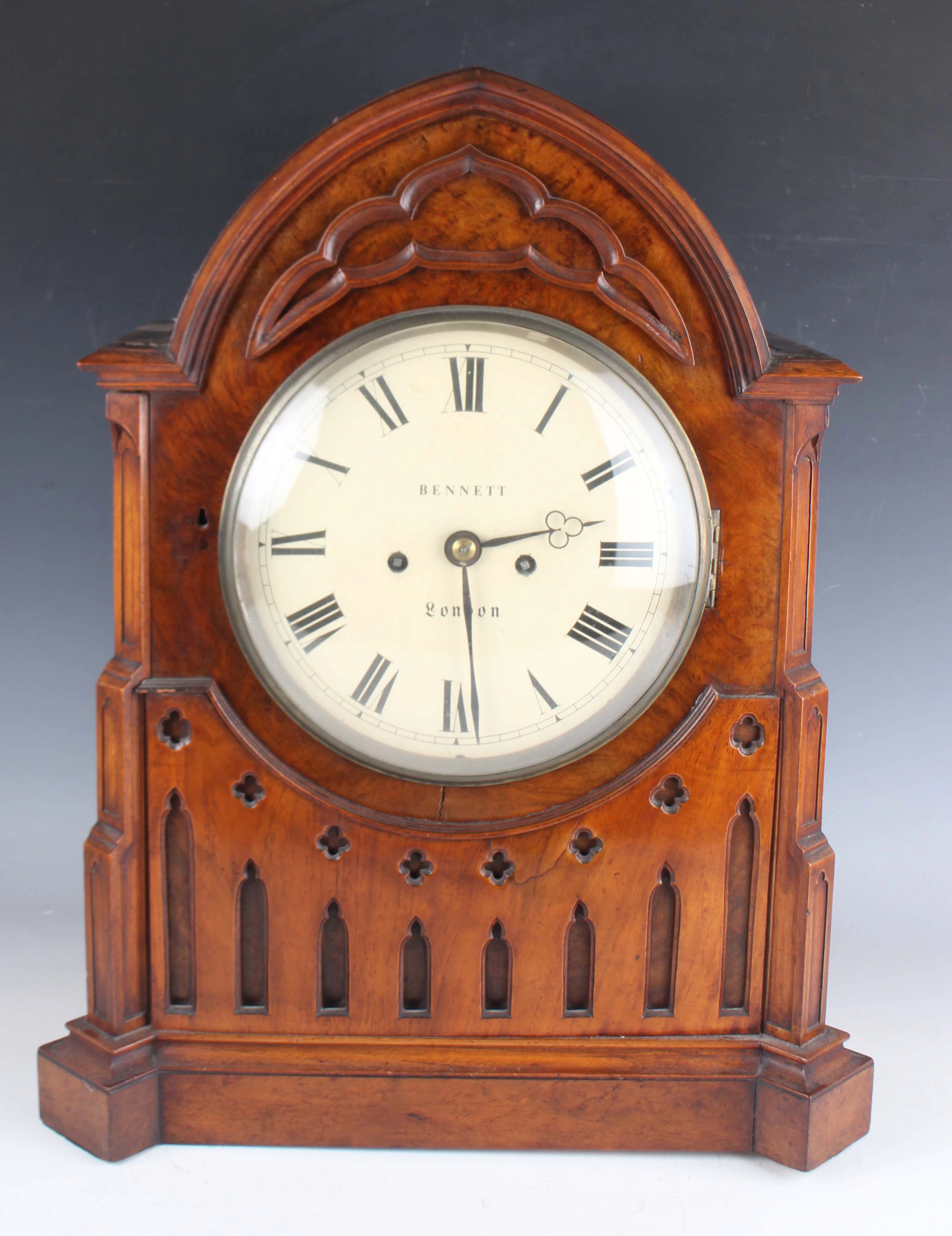 A Victorian Gothic Revival walnut cased bracket clock, the eight day