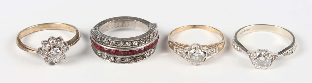 A 9ct white gold ring, claw set with a circular cut colourless cubic