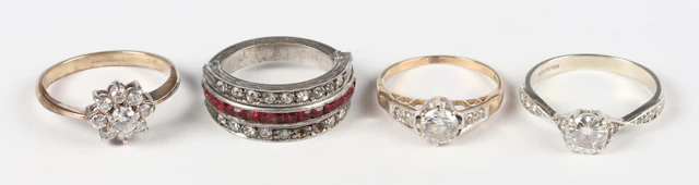 A 9ct white gold ring, claw set with a circular cut colourless cubic