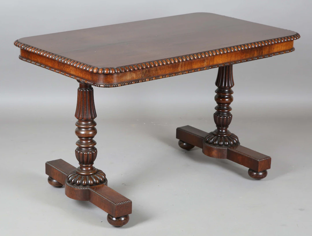 A William IV rosewood library table, in the manner of Gillows of Lancaster