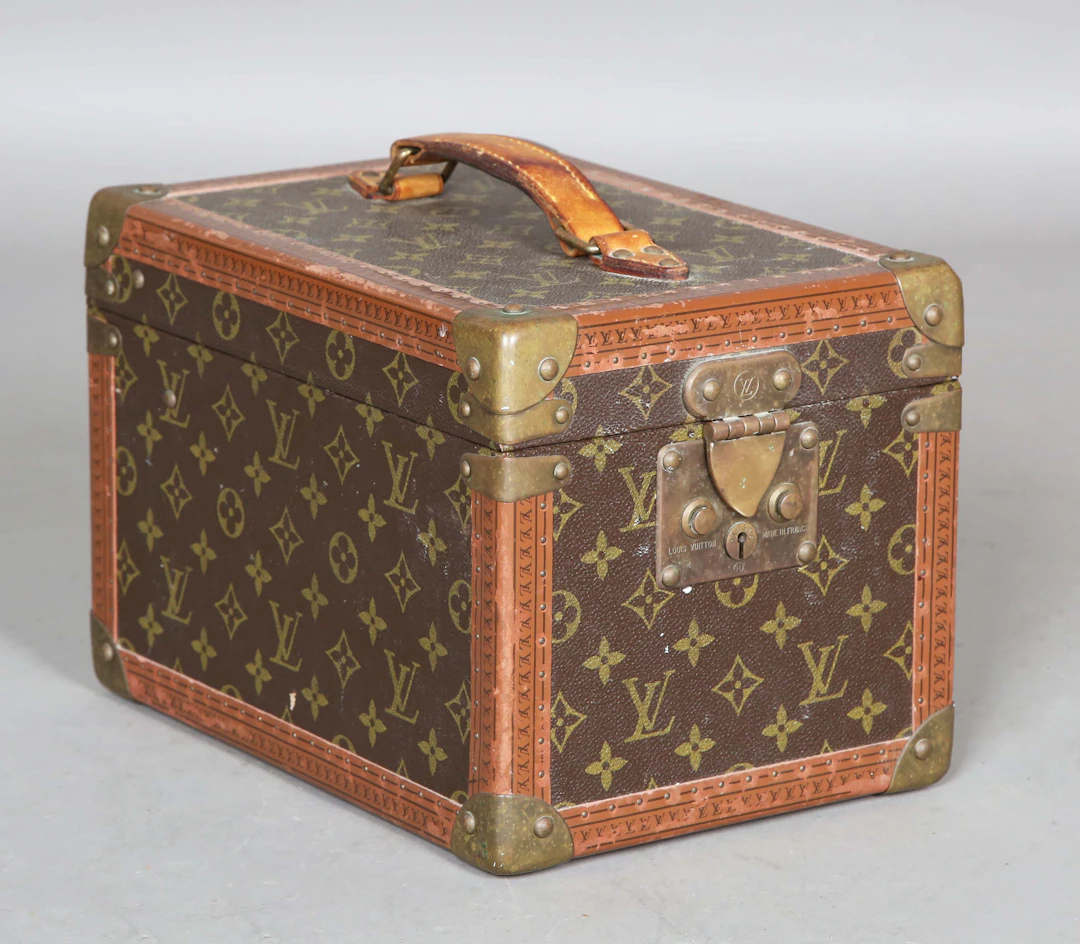 A Louis Vuitton Boite à Flacons vanity case with overall monogrammed