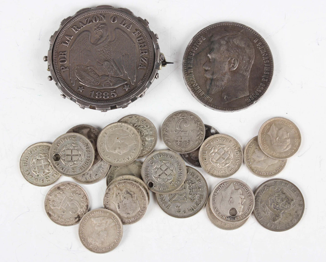 A Russia Nicholas II one rouble 1897 and a small collection of other
