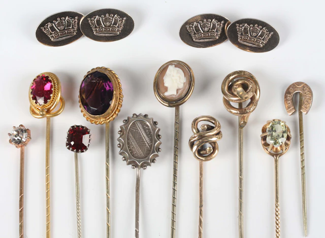 Ten Victorian and later stickpins, including examples mounted with