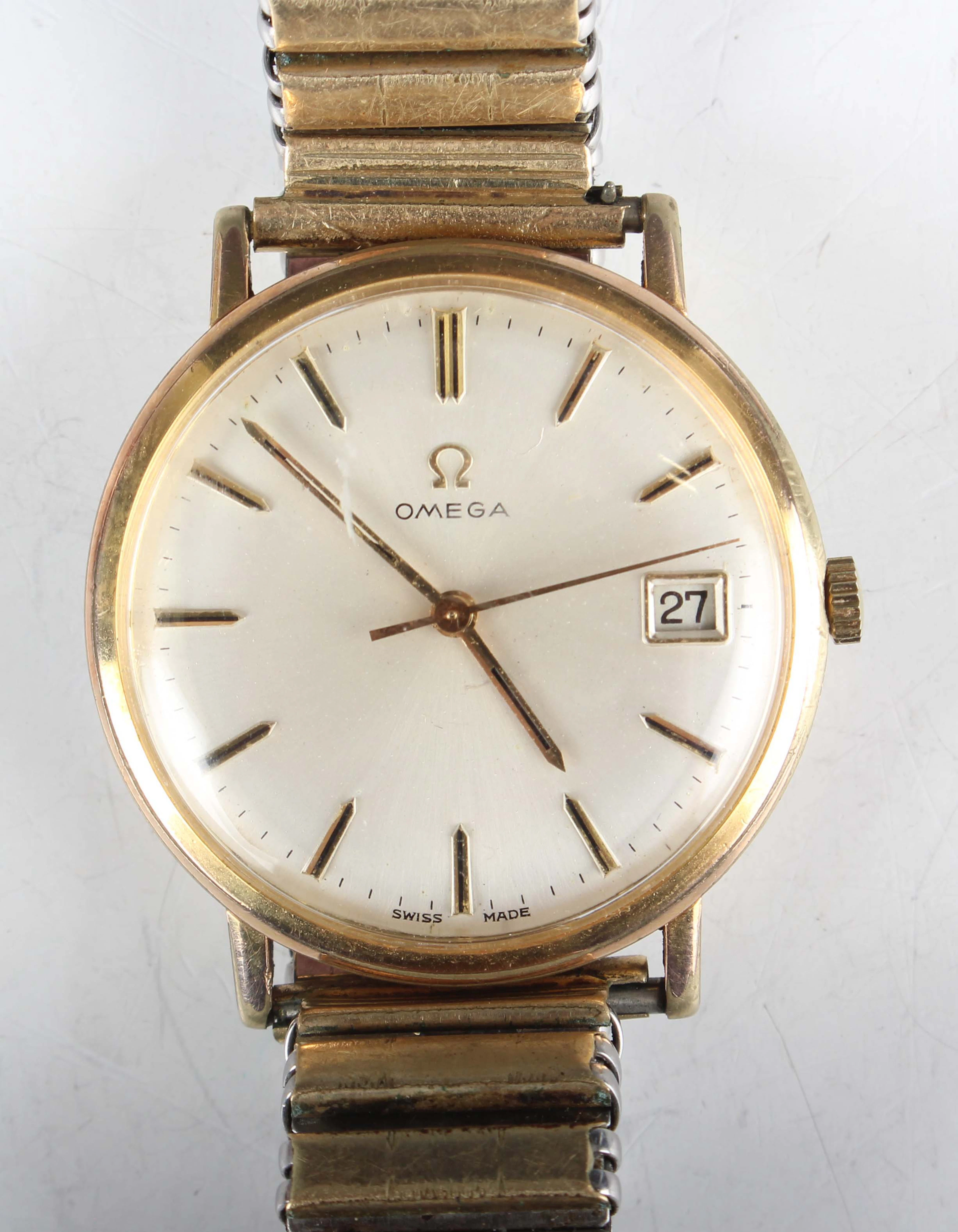 An Omega gilt metal fronted and steel backed circular cased gentleman's