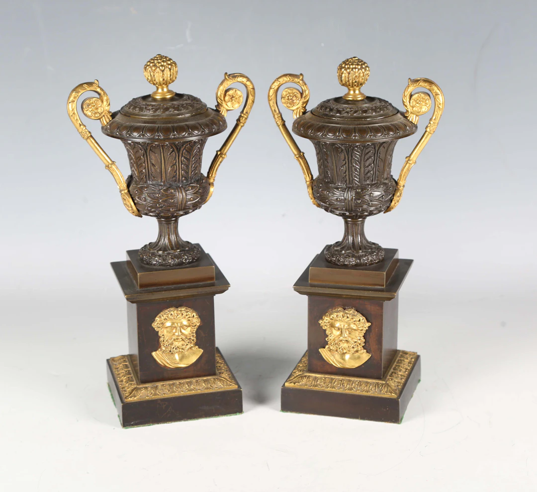 A pair of 19th century Continental brown patinated bronze and gilt