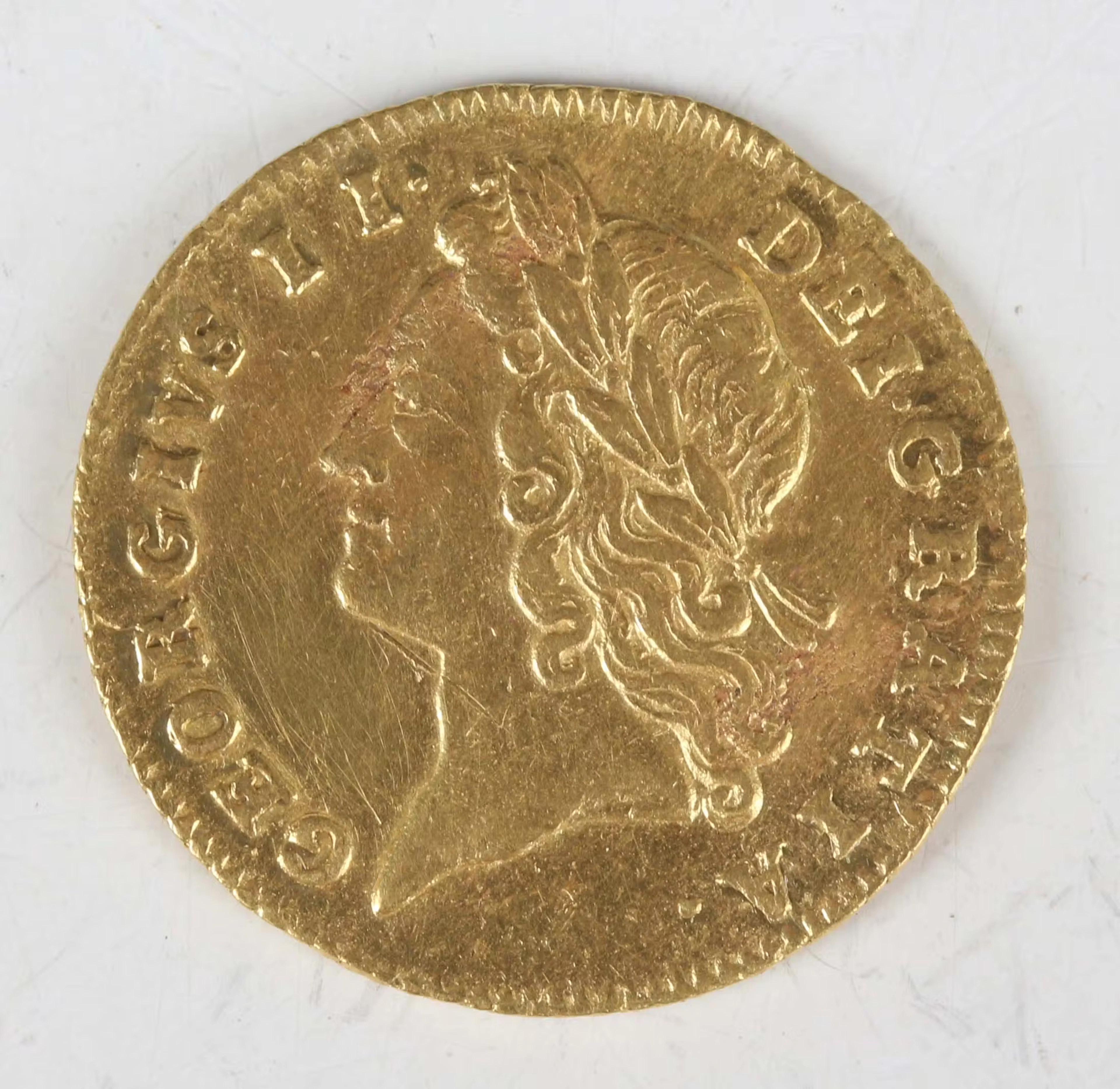 A George II half-guinea 1731, young laureate head, Sp 3681 (an excavated