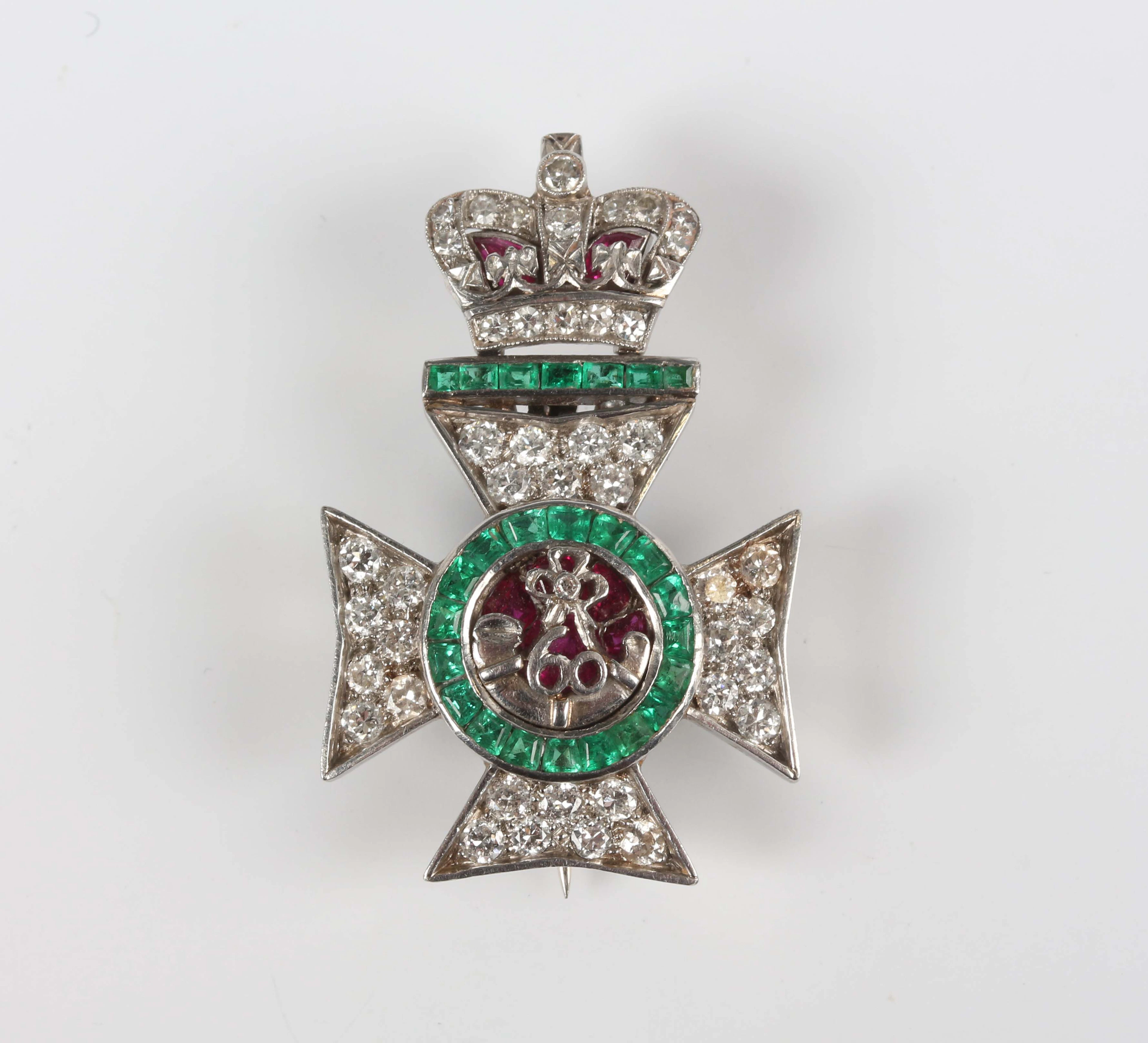 A platinum, emerald, ruby and diamond King's Royal Rifles sweetheart