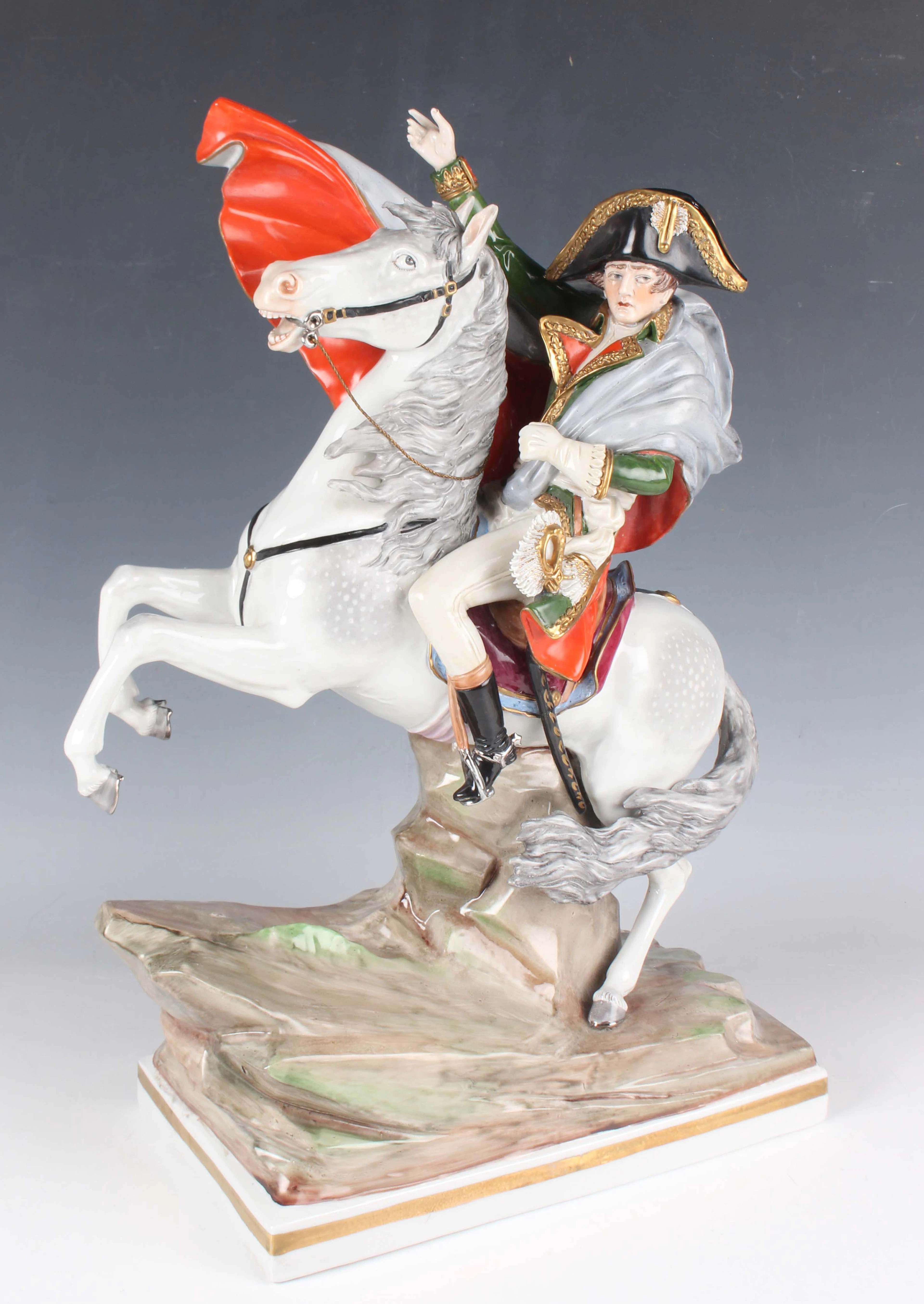 A Sitzendorf porcelain figure group of Napoleon on horseback, second