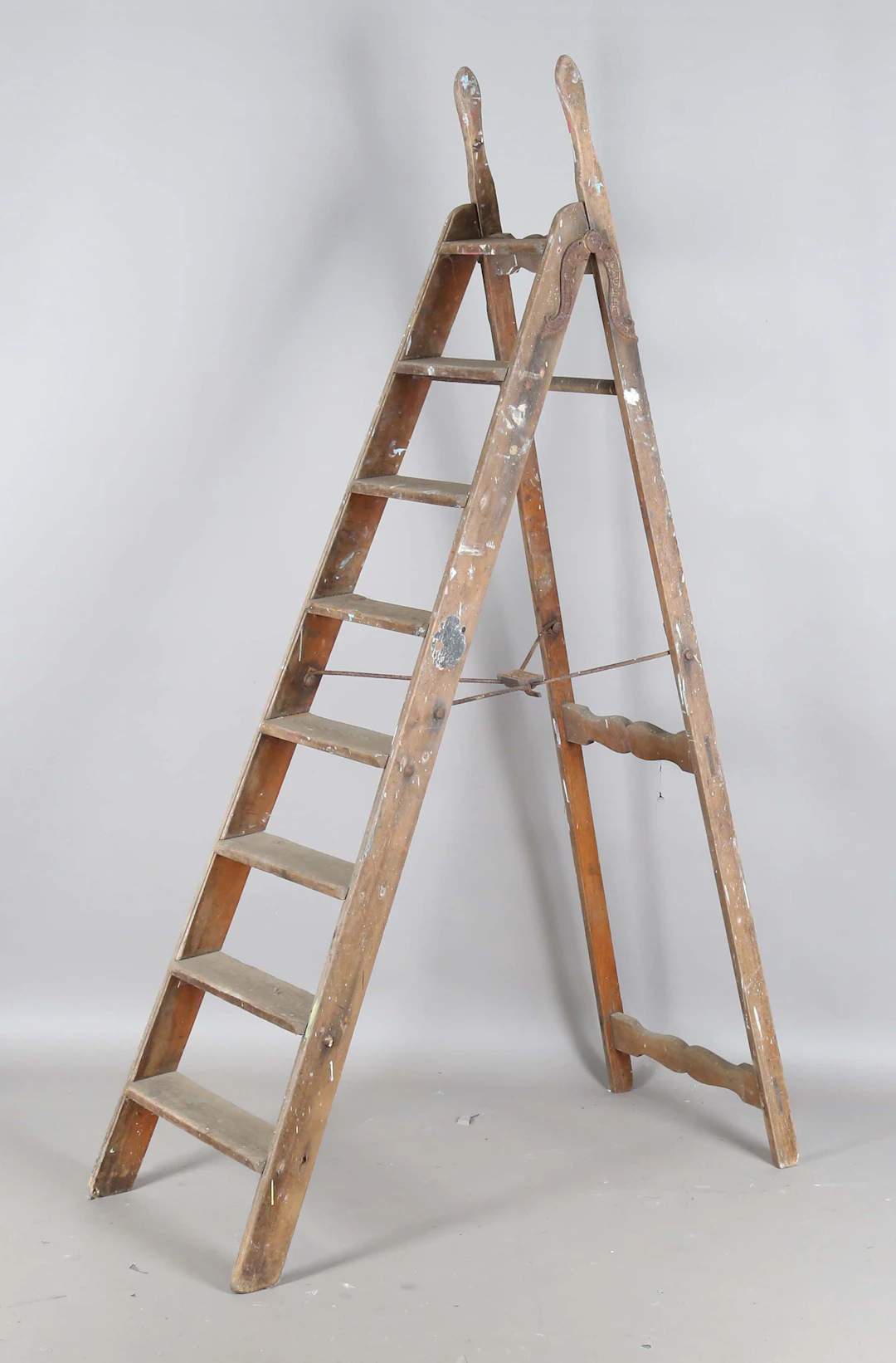 An Edwardian pine framed and iron mounted 'Simplex' folding ladder