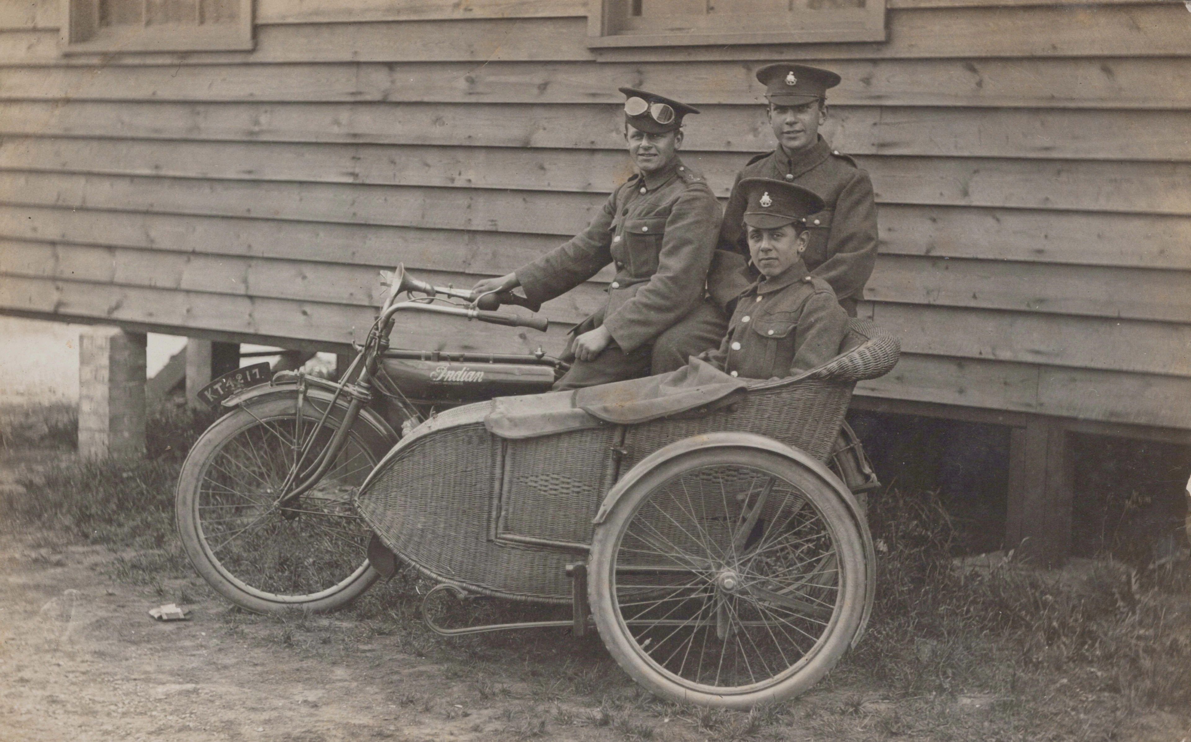 An album containing approximately 141 postcards, the majority of military