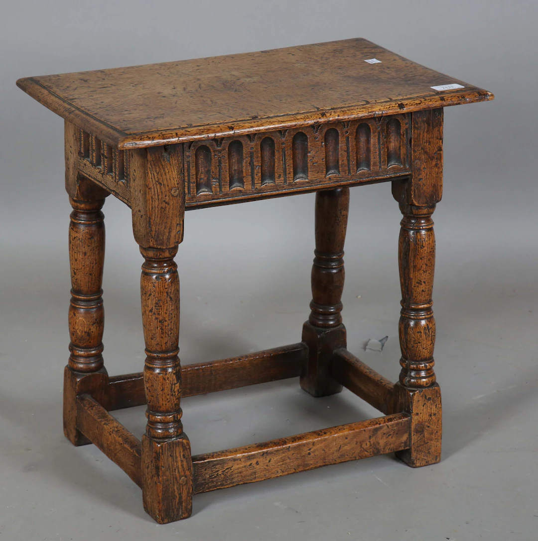 A mid-20th century Carolean Revival oak joint stool, height 50cm