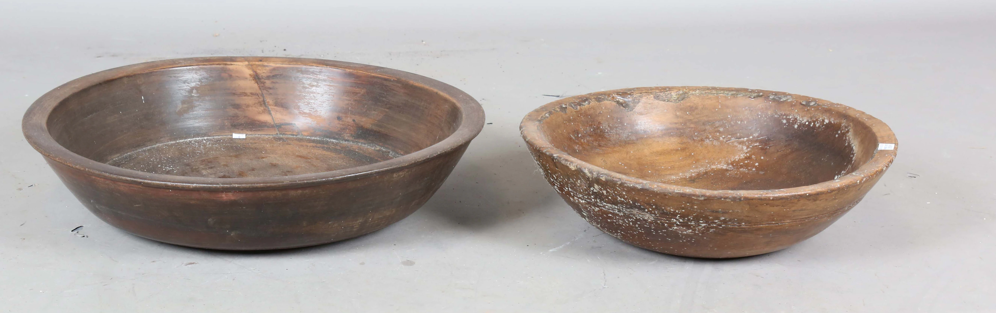 A large 18th century fruitwood dairy bowl, diameter 54cm, together