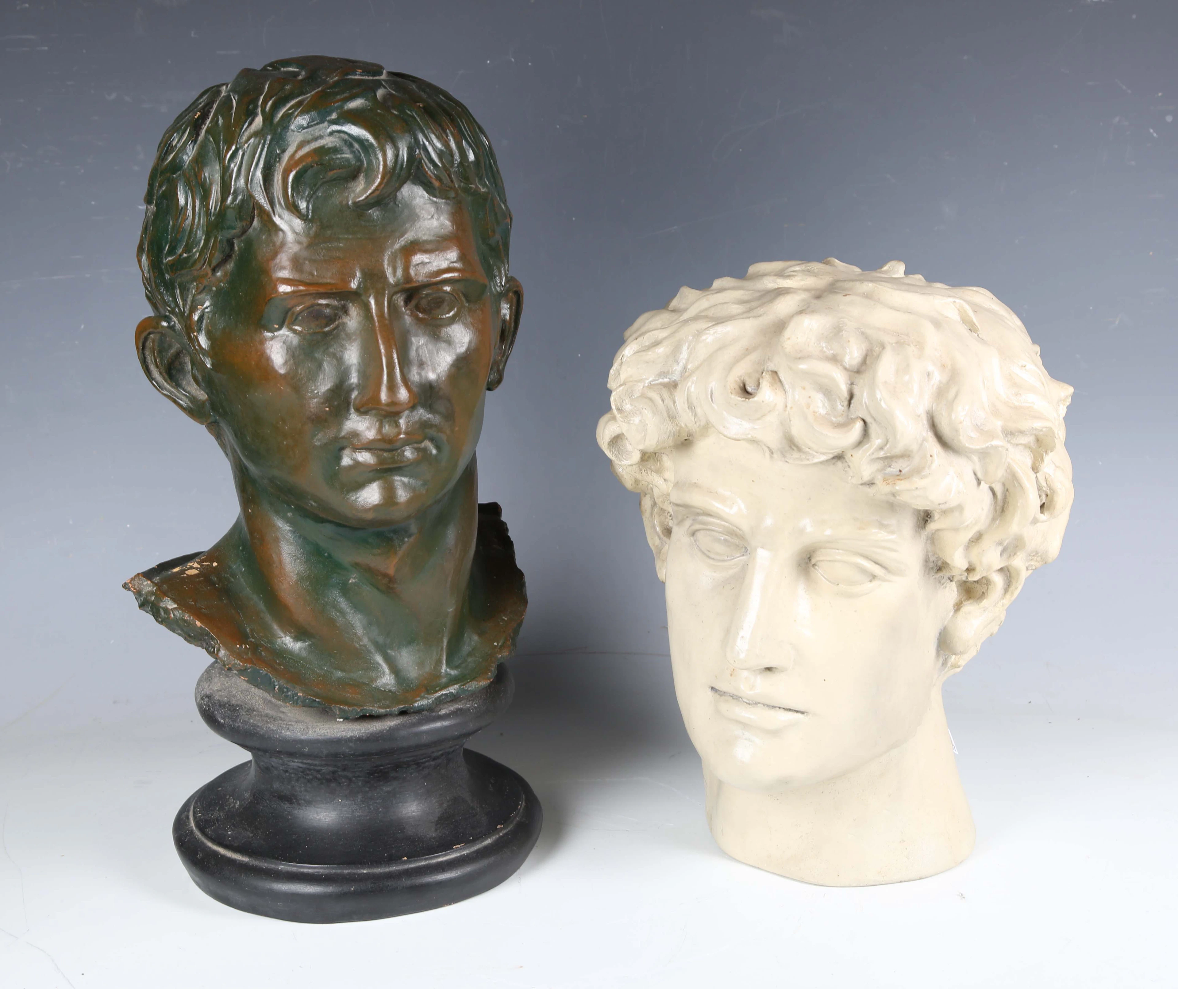 A modern bronzed cast composition bust of the young Julius Caesar