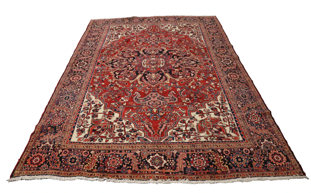 A Heriz carpet, North-west Persia, mid-20th century, the red field