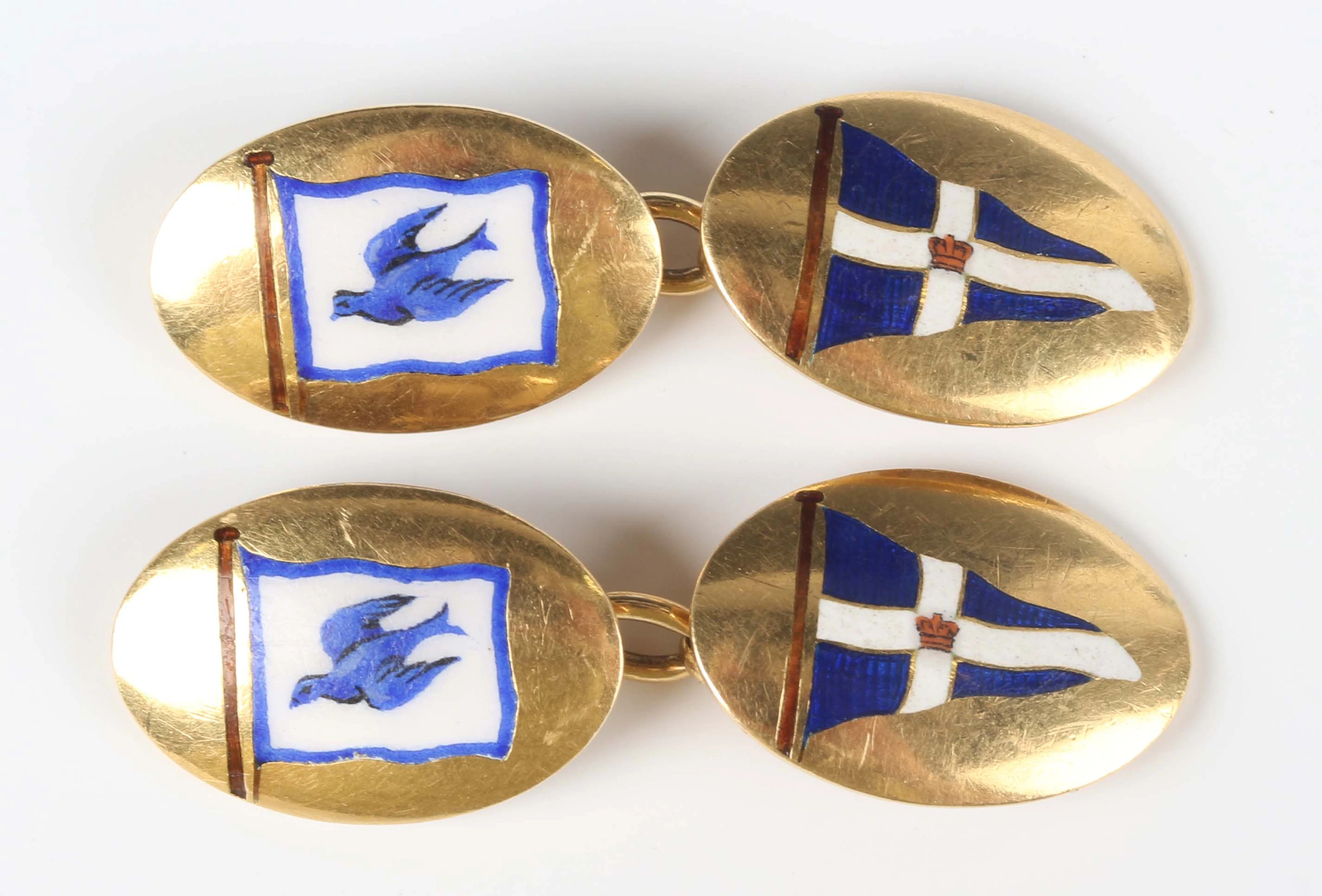 A pair of Harrods gold and enamelled maritime cufflinks, each depicting