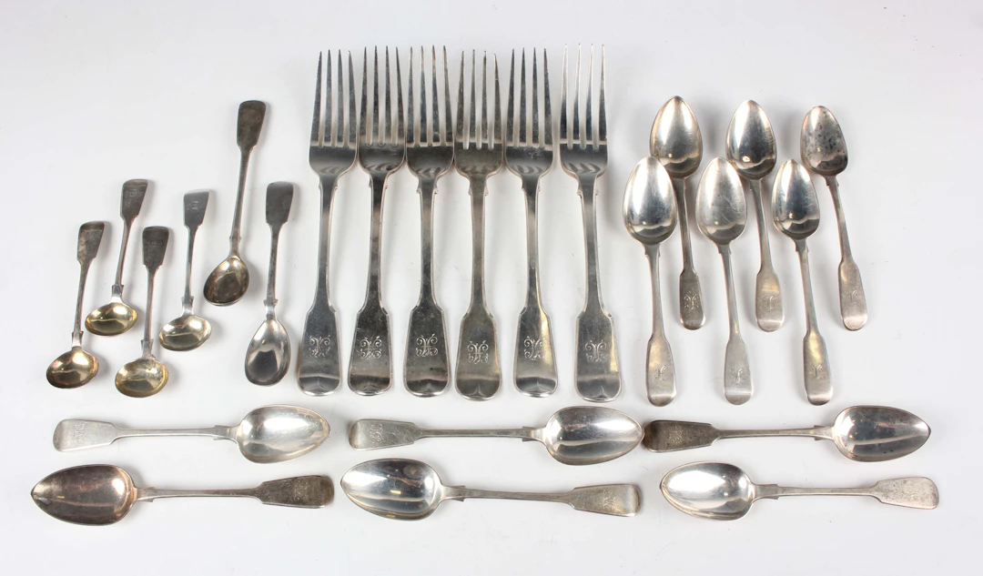 A group of George III and later silver Fiddle pattern cutlery, including