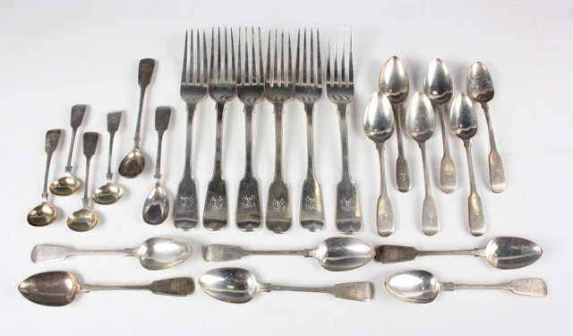 A group of George III and later silver Fiddle pattern cutlery, including