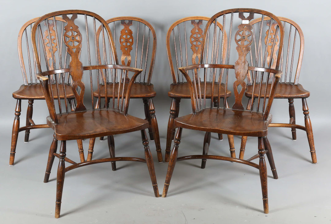 A set of six 20th century beech and elm framed Windsor chairs, comprising