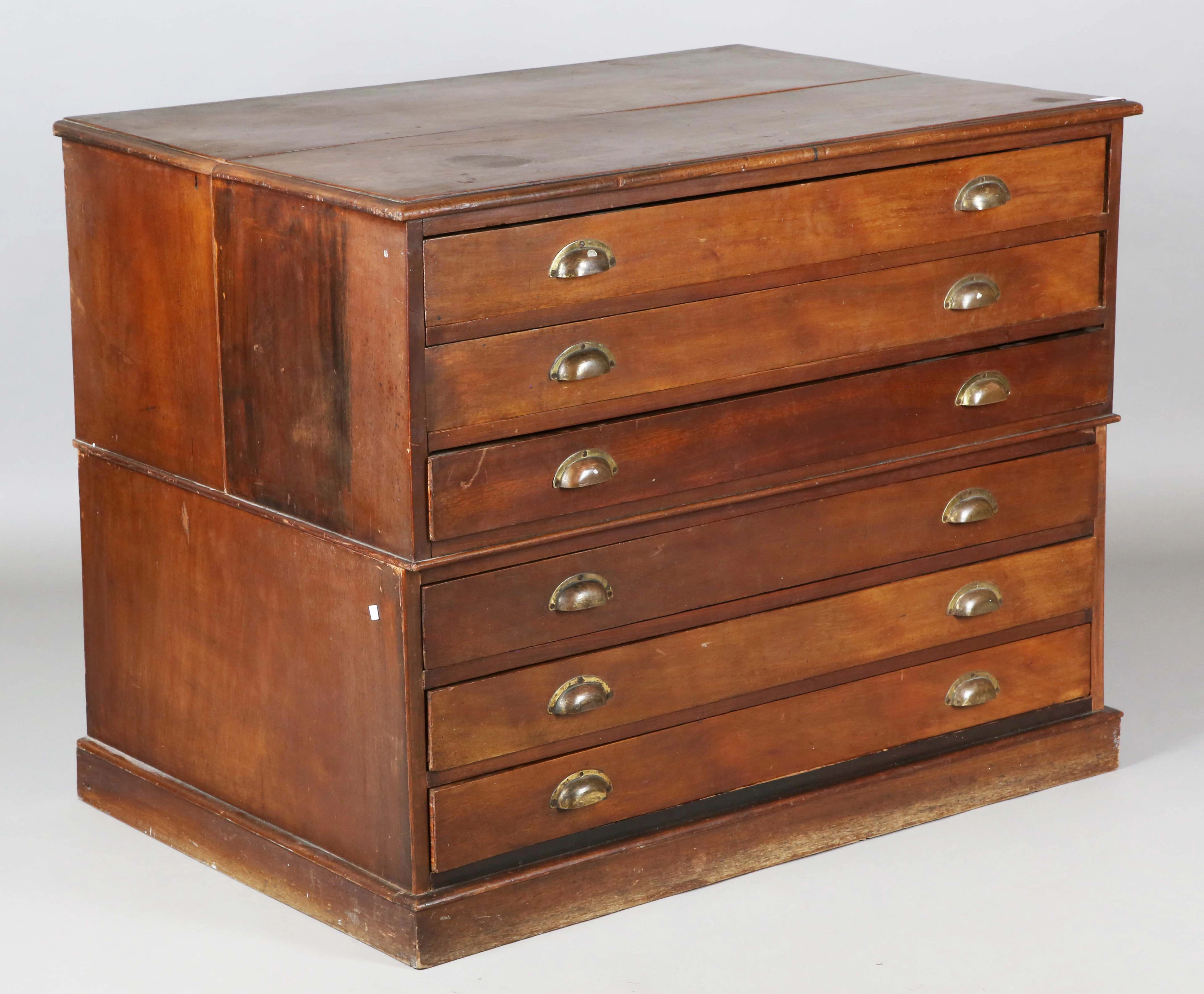 A late Victorian walnut planner's or folio chest of six drawers, all