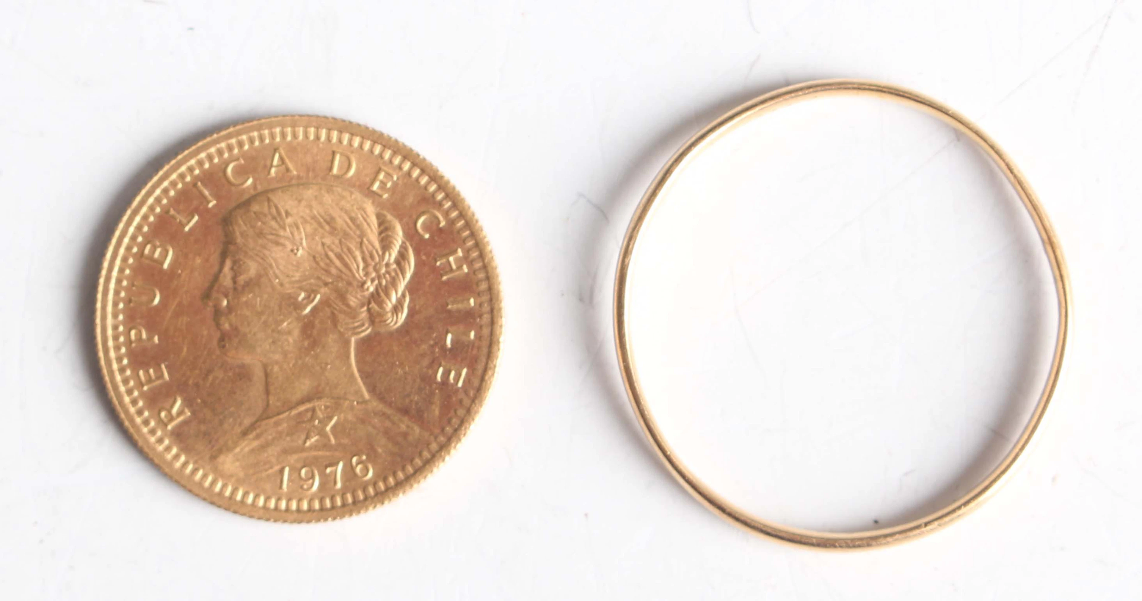 A Chile gold twenty pesos 1976, within a presentation case, together