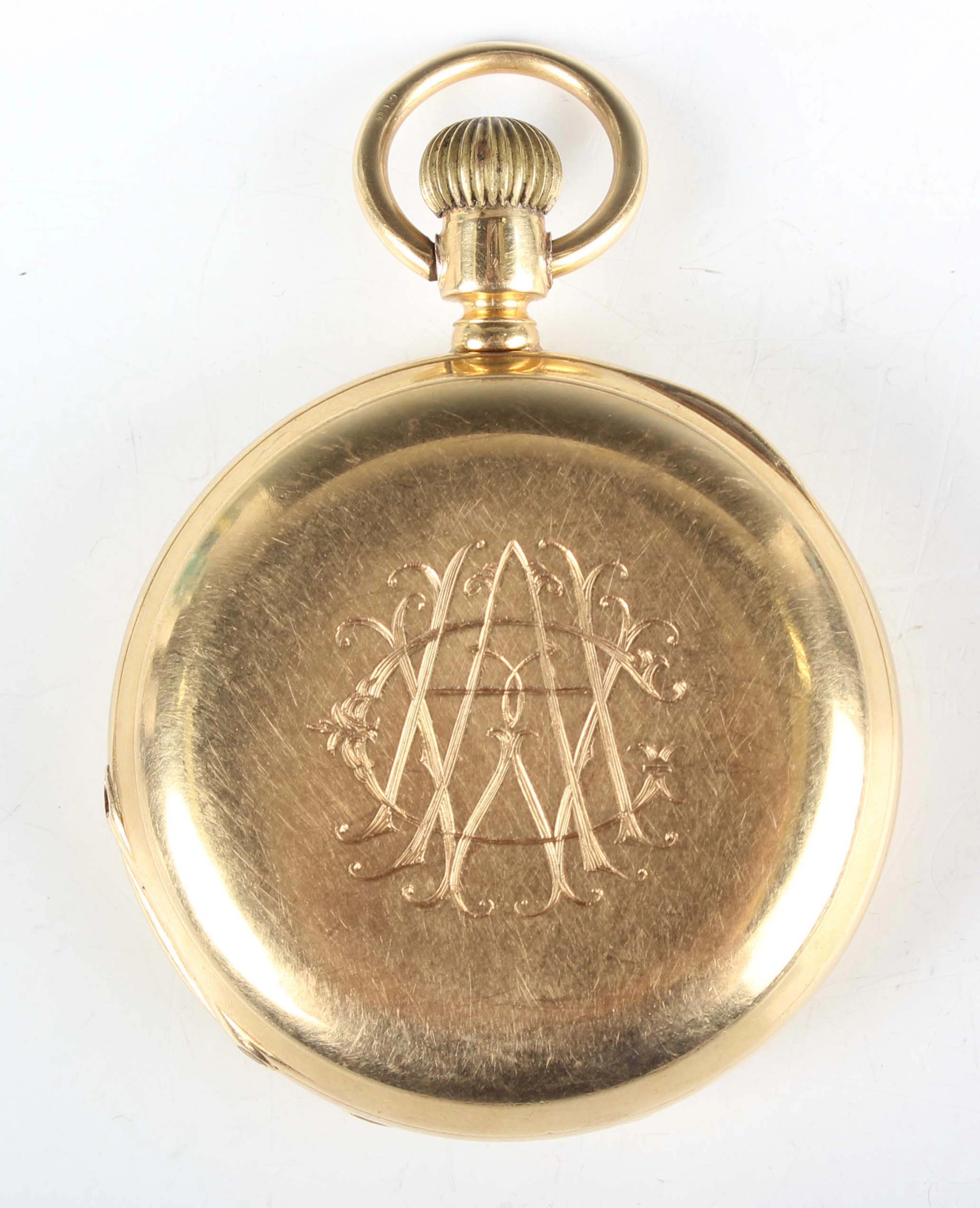 An Omega 18K gold hunting cased keyless wind gentleman's pocket watch