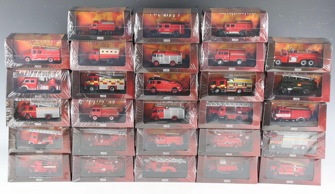 Twenty-eight Atlas Editions model fire engines, including AEC Regent