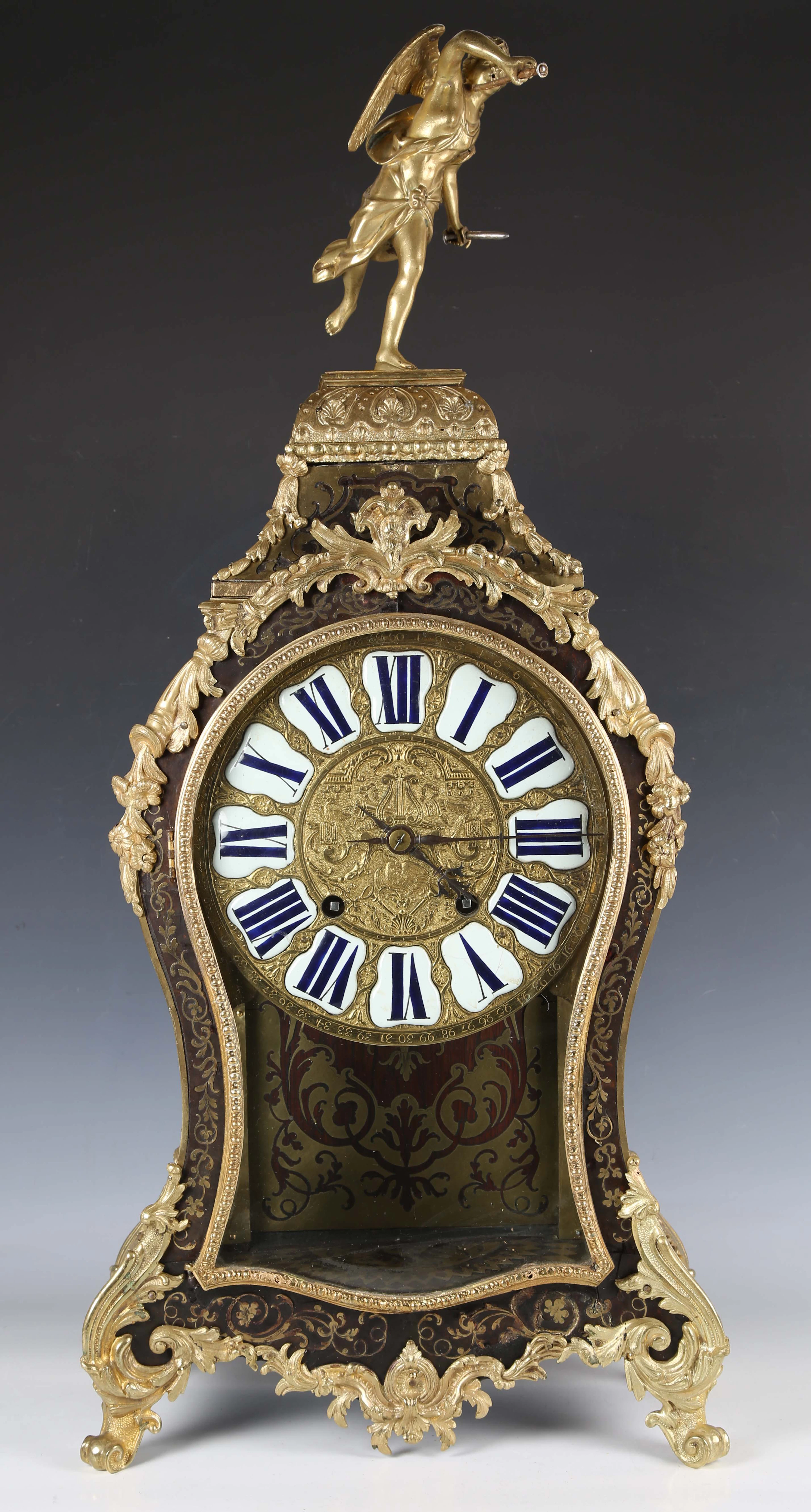 A Louis XV brown tortoiseshell and gilt brass boulle cased bracket