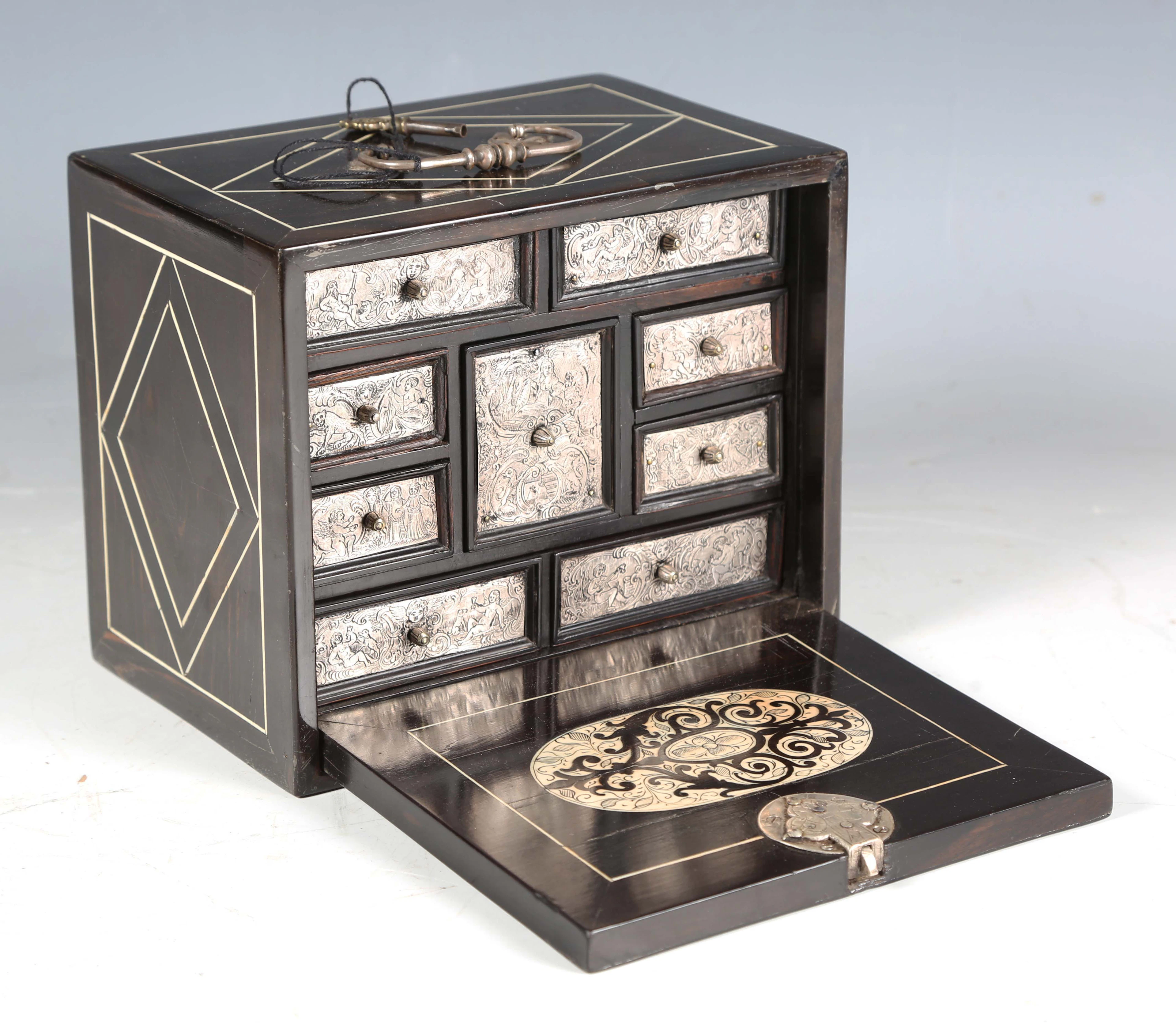 A fine 17th century Central European ebony veneered and ivory line